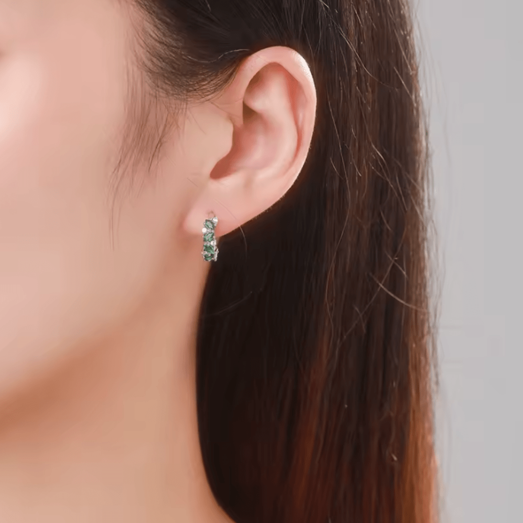 Green onyx hoop earring worn on ear – elegant round-cut gemstone with polished silver finish by Moonela