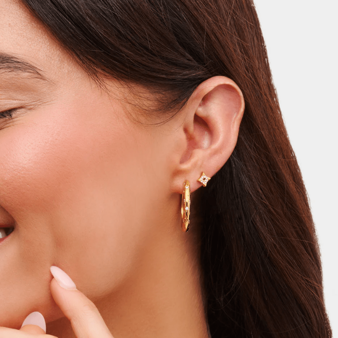 woman wearing minimalist gold hoop earrings – personalised jewellery for everyday wear